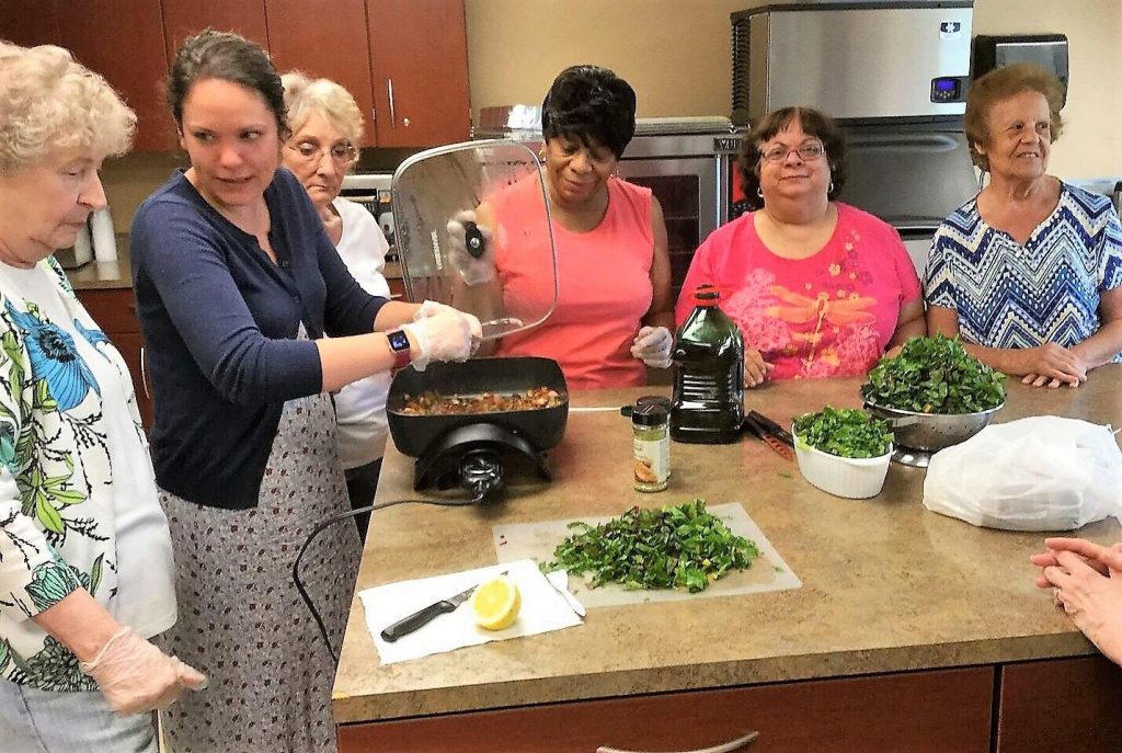 Brass City Harvest staff nutritionist Nichole Texeira, MPH, teaching a cooking and nutrition class.